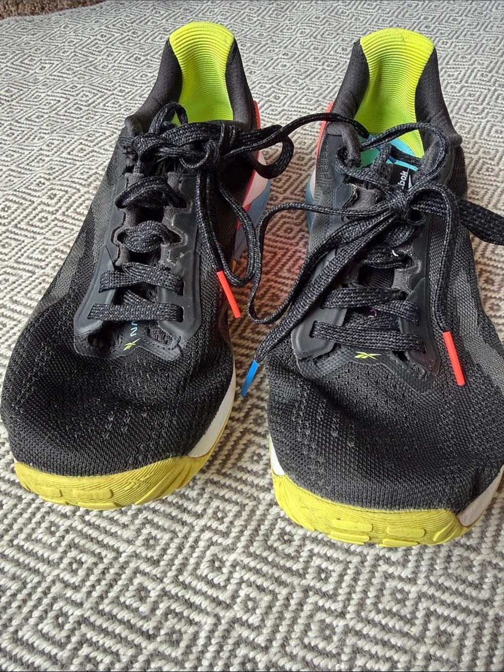 Reebok Nano X1 Black Running Shoes with Yellow, Red and Blue Accents